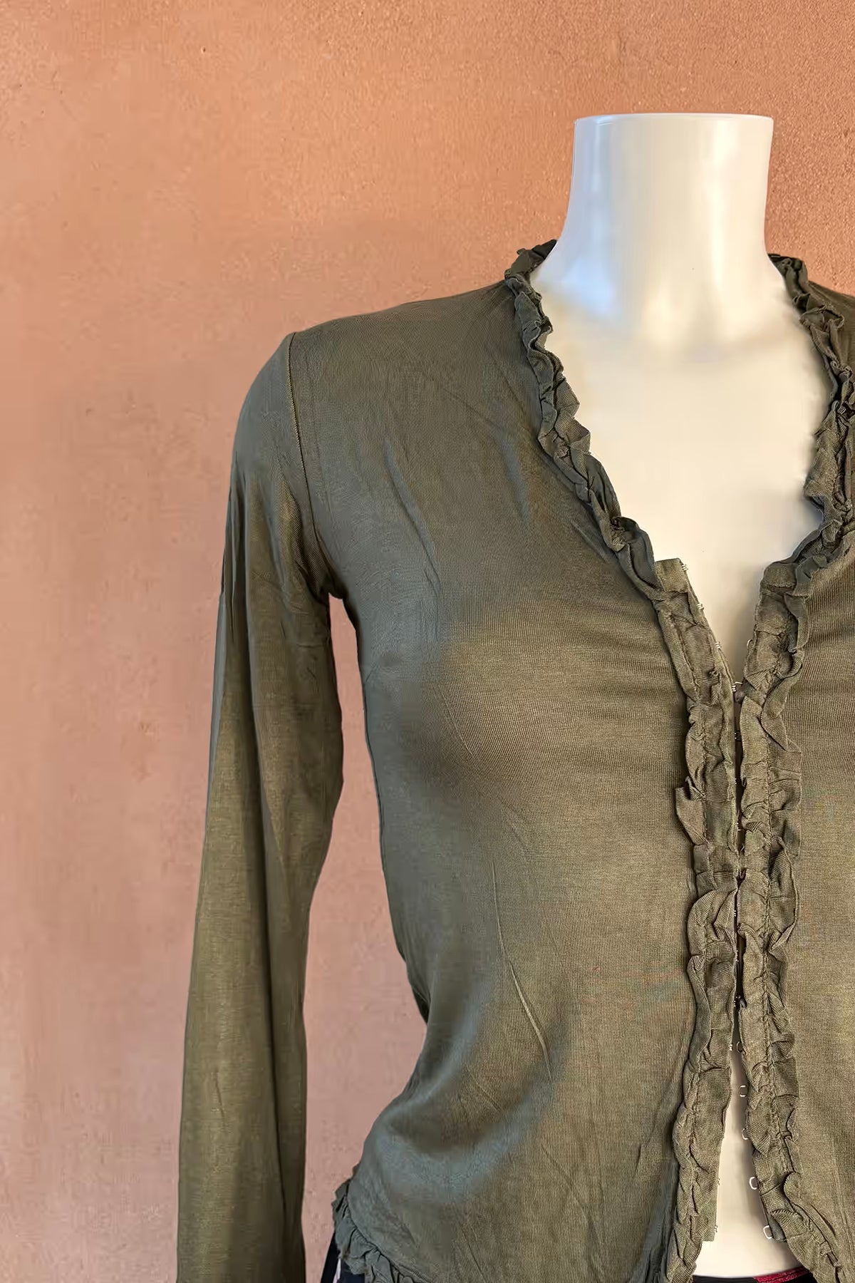 The Olive Buckle Ruffle Top