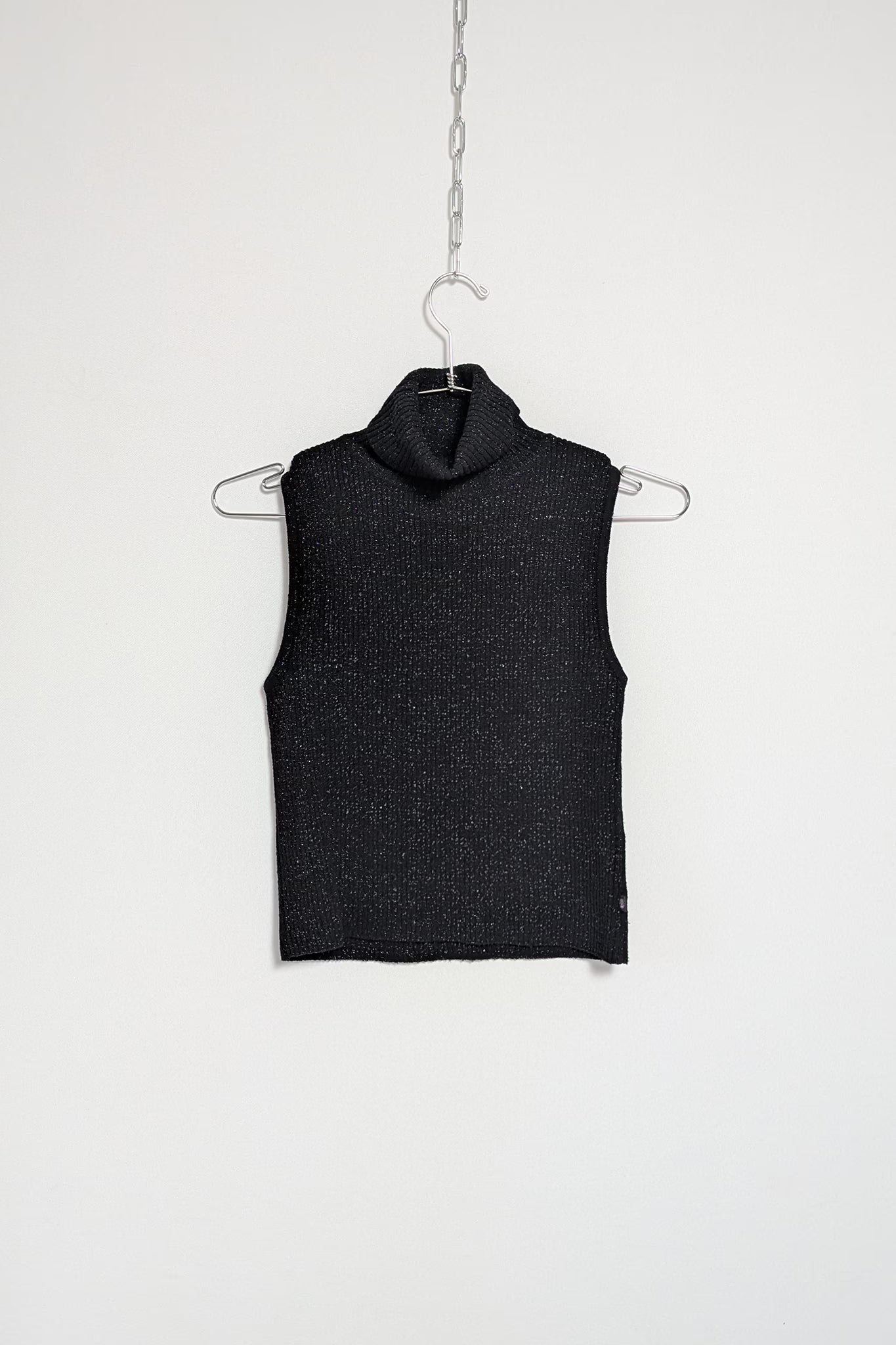 The Sleeveless Turtleneck Knit Top
