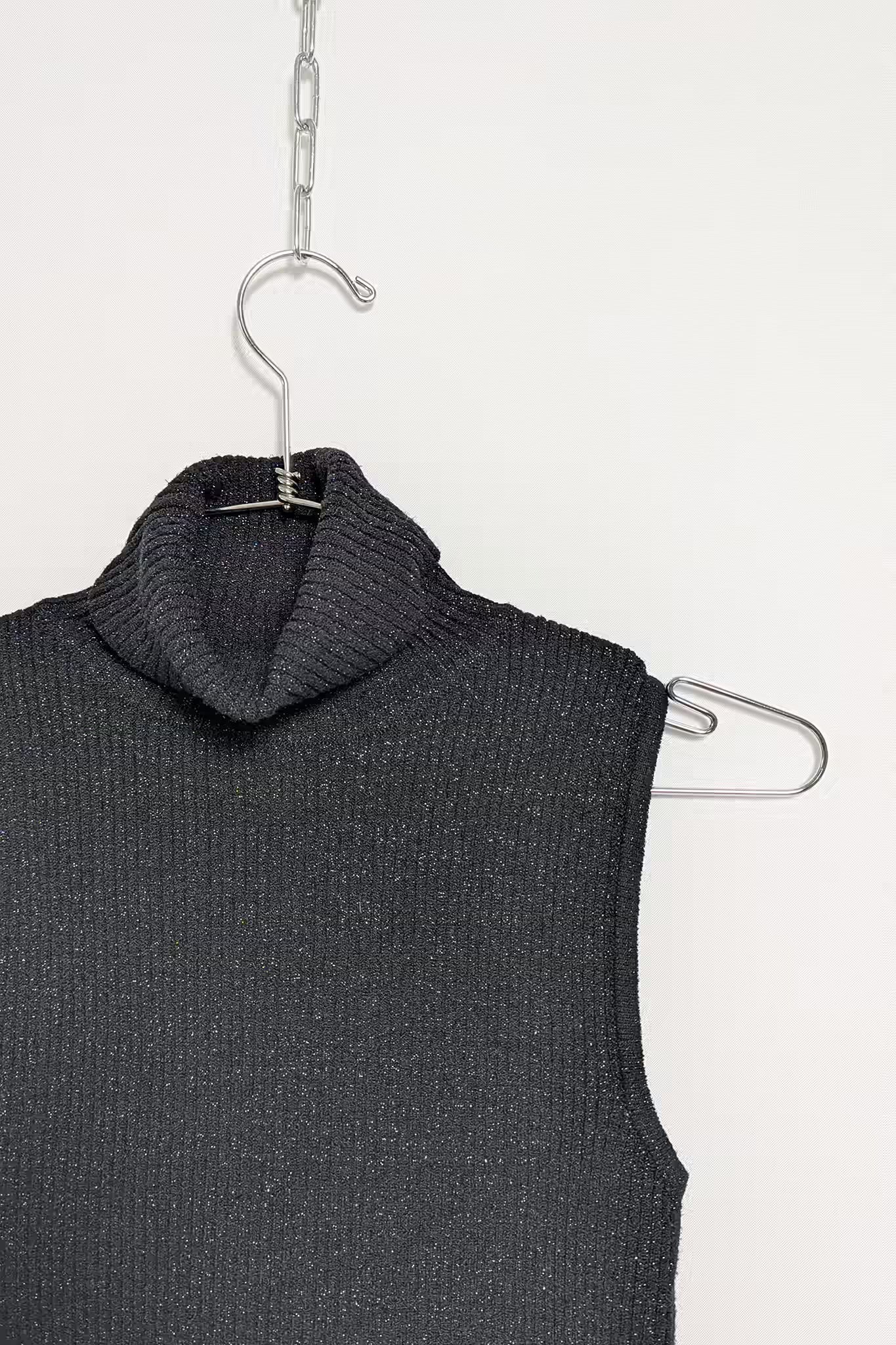 The Sleeveless Turtleneck Knit Top