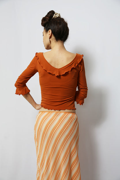The Smokey-Orange Ruffled Stretch Top